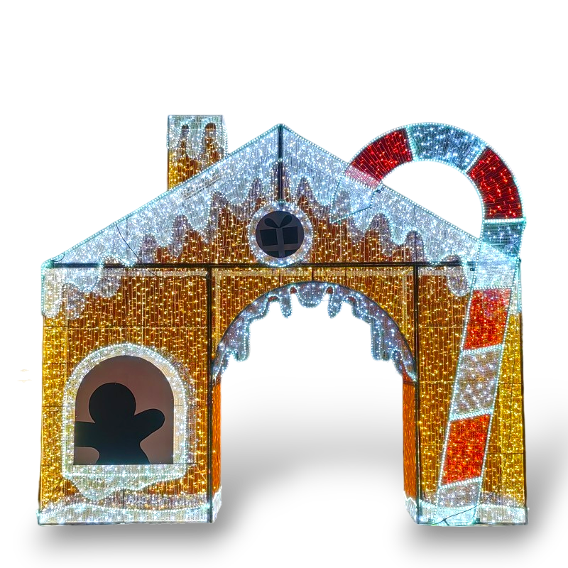 Isolated LED gingerbread house holiday display with glowing candy cane, snow-covered roof, and gingerbread figure window, shown on transparent background