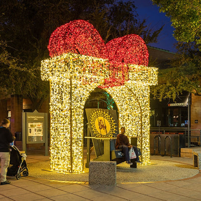 Picture of Certified Lights' large outdoor Christmas decorations. This is a giant walk-through gift box decoration for commercial Christmas and holiday decorations